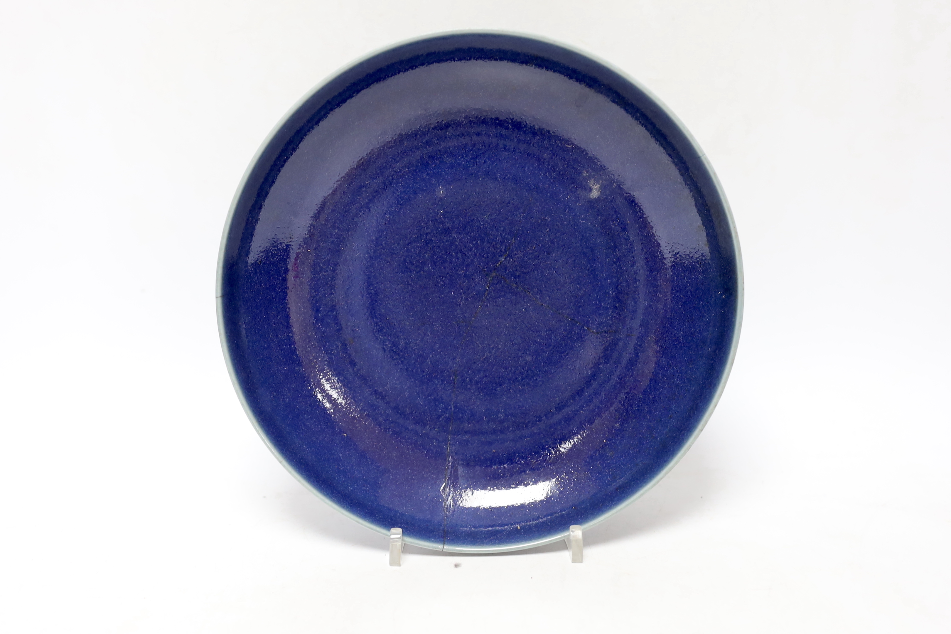 A Chinese Yixing ‘tree branch’ teapot, 13cm, A 20th century Tibetan kapala cover, 9cm and a Chinese blue glazed dish, Yongzheng mark but later, 22.5cm diameter